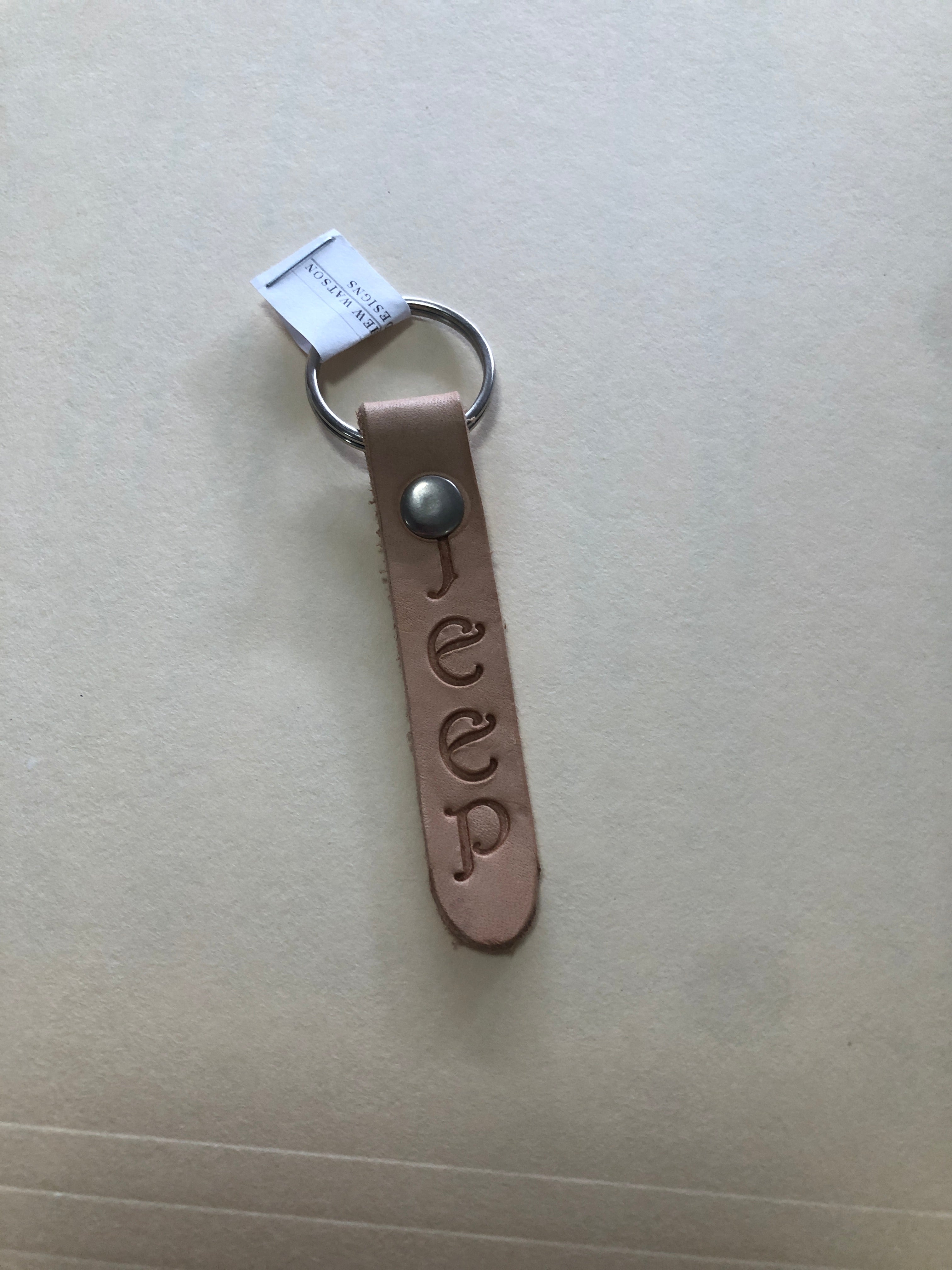 Stamped painted leather keychain