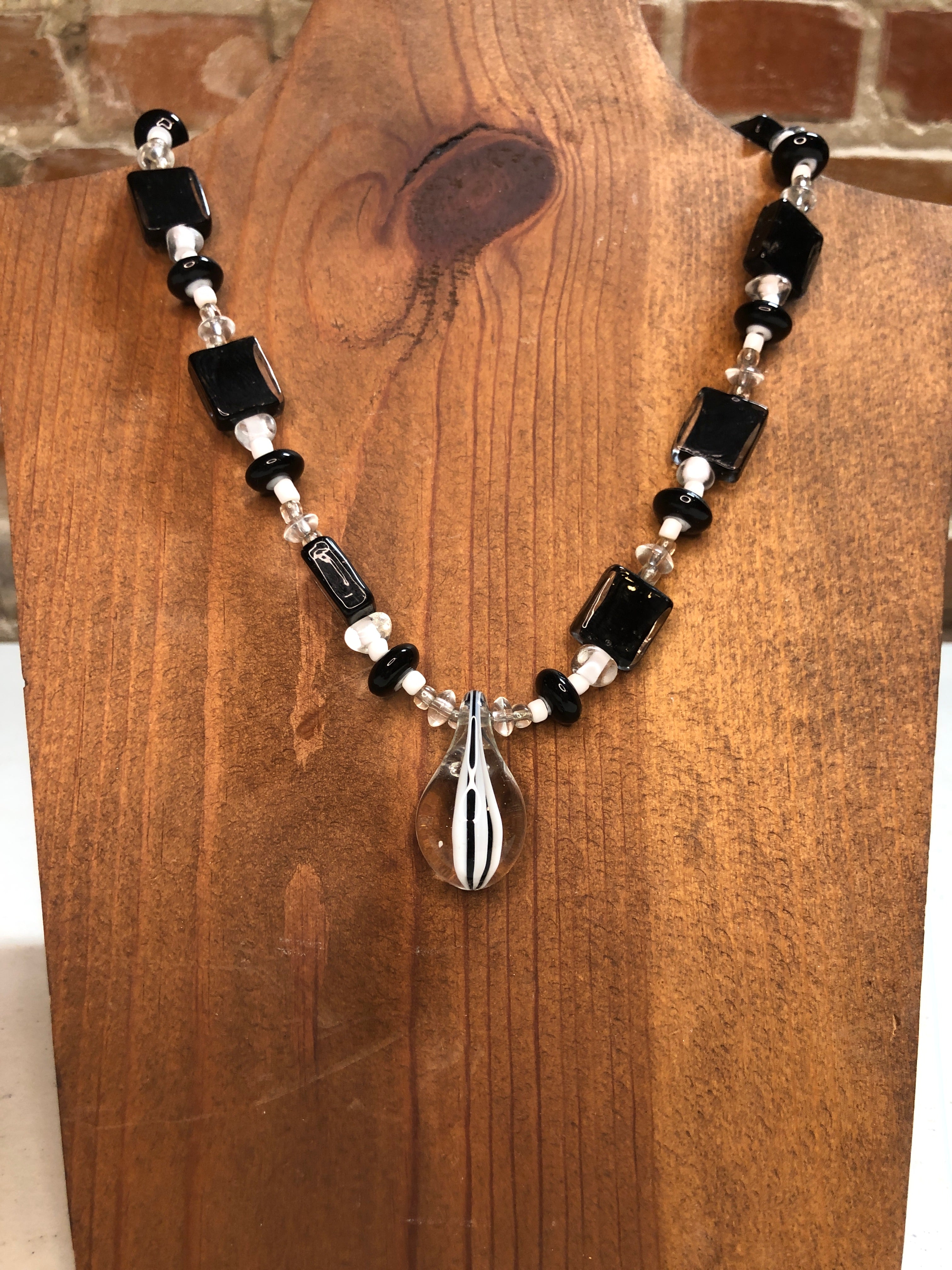 Black & white beaded glass with pendant