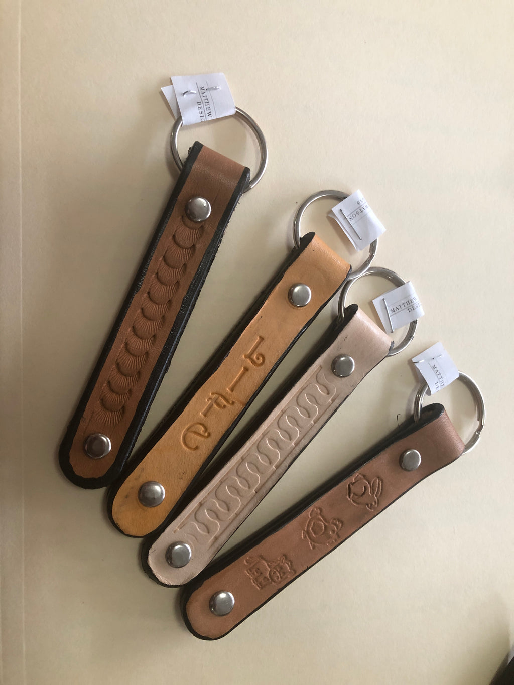 Stamped leather key chains