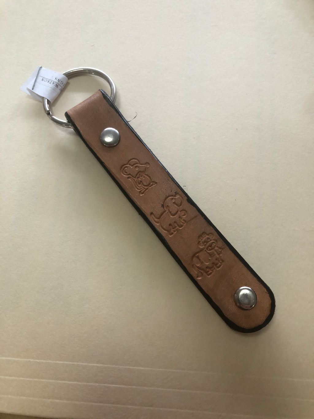 Stamped leather key chains