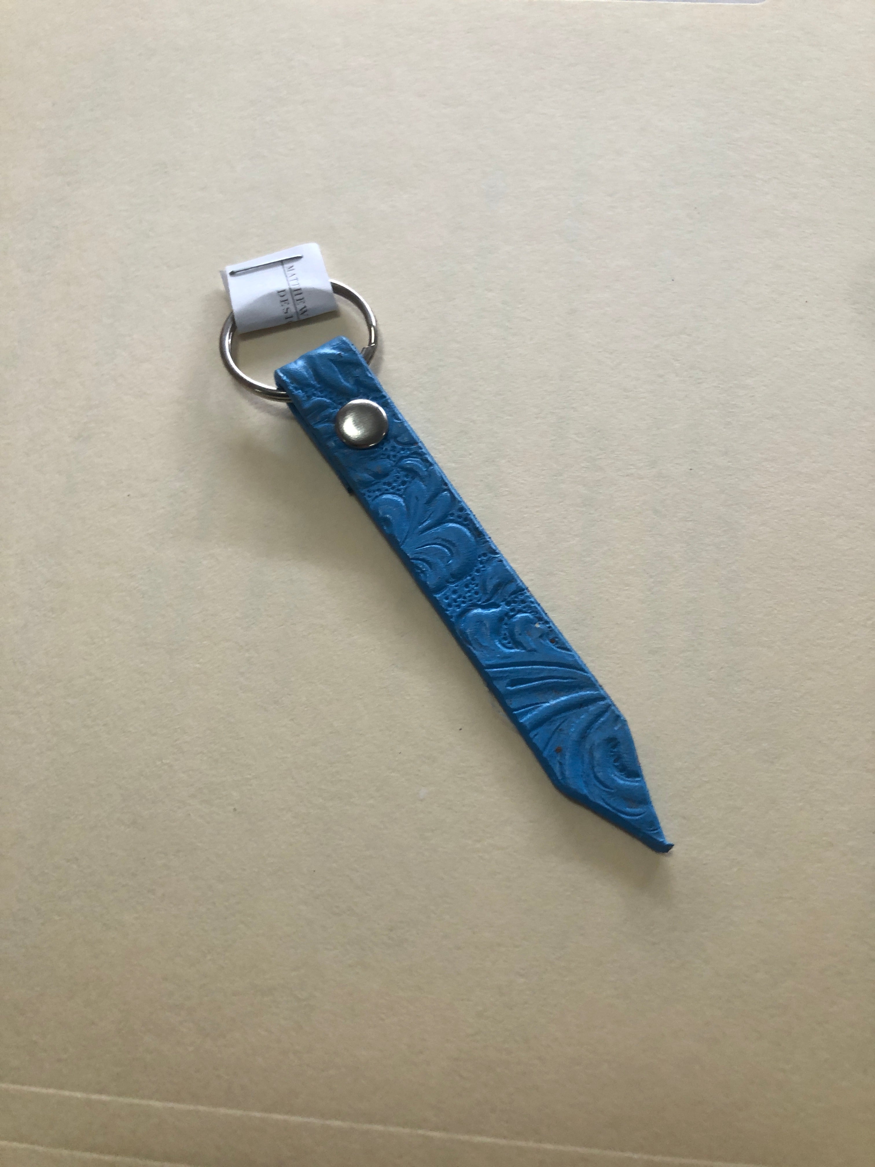 Stamped painted leather keychain