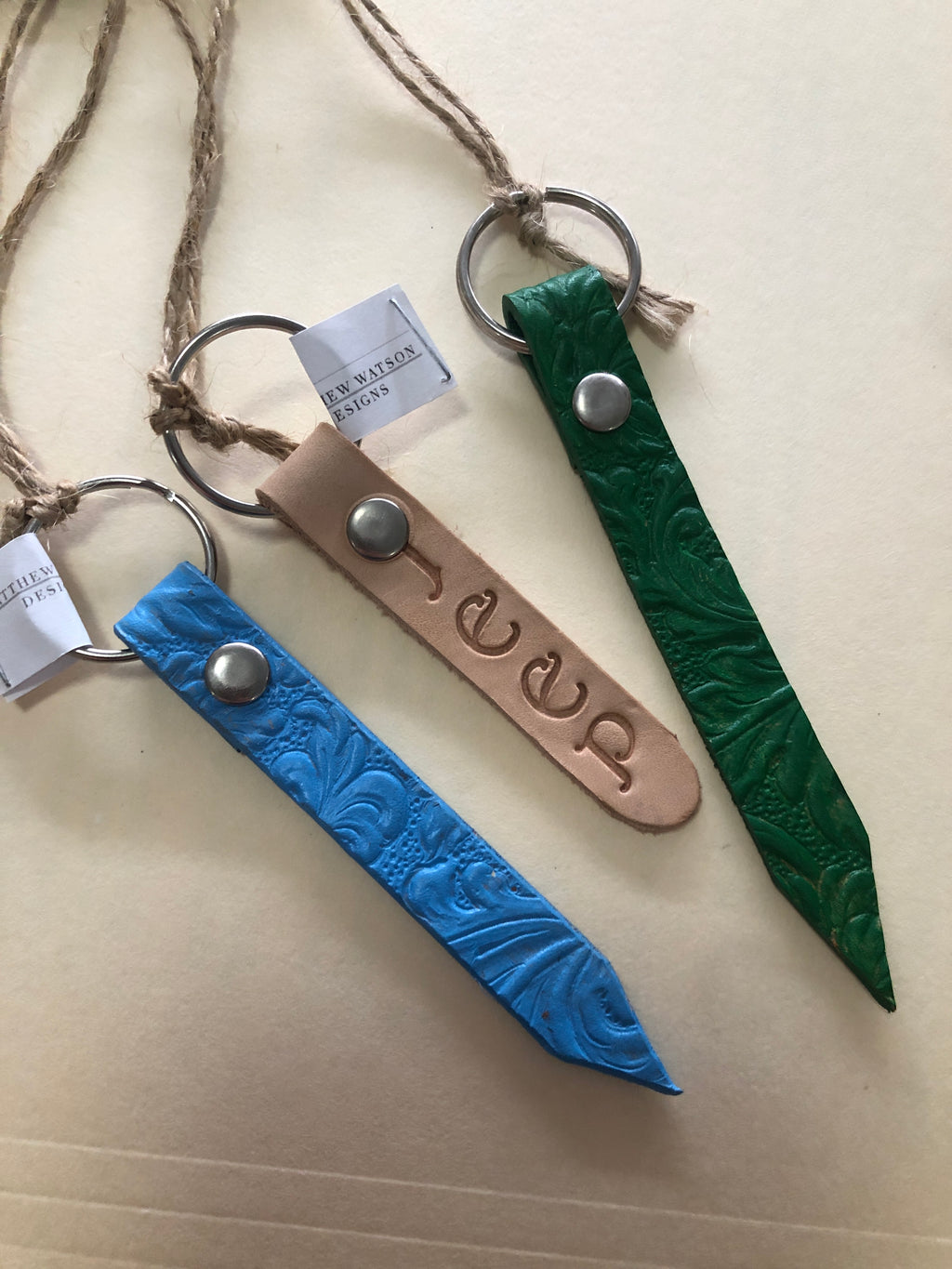 Stamped painted leather keychain