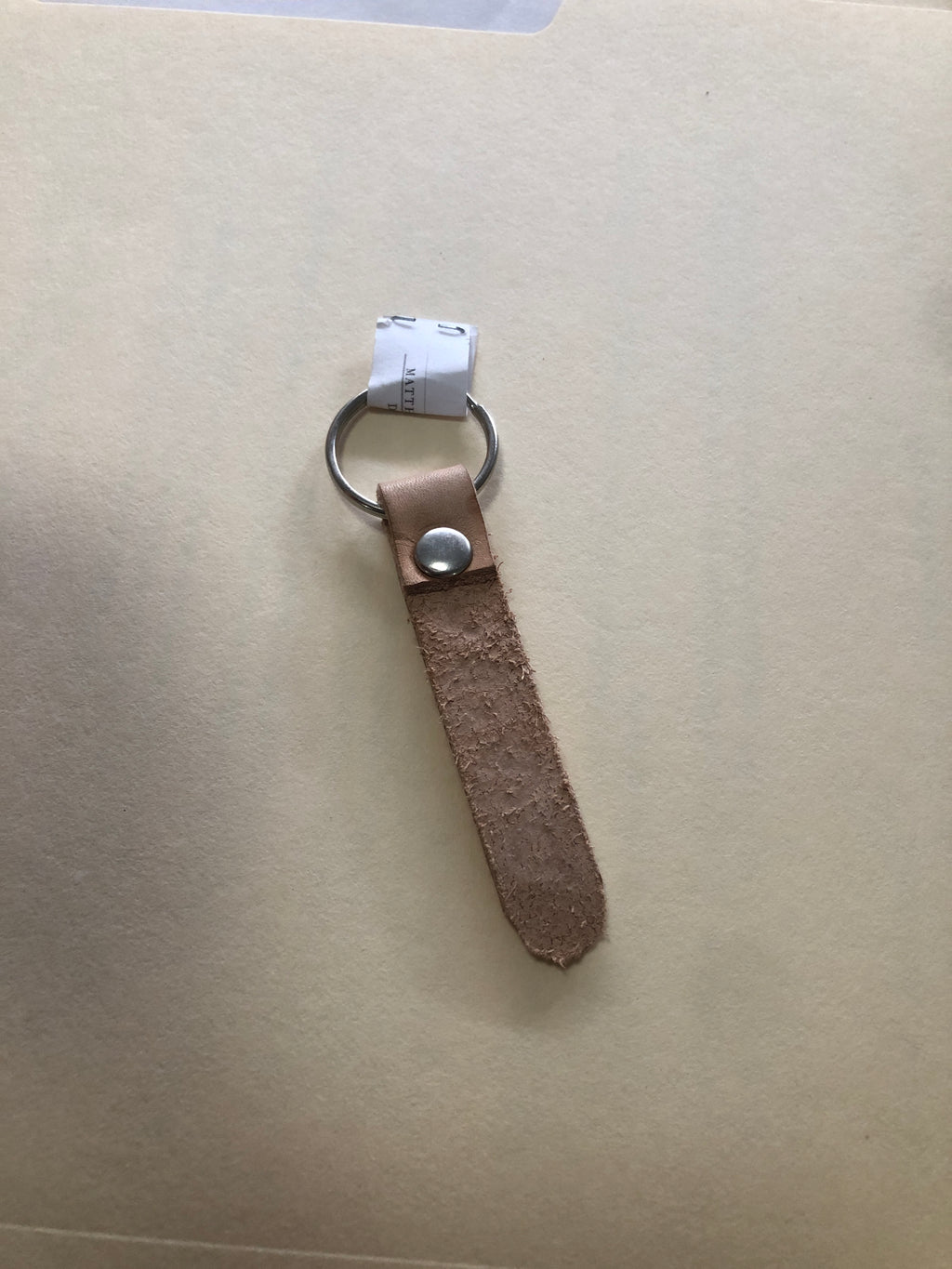 Stamped painted leather keychain