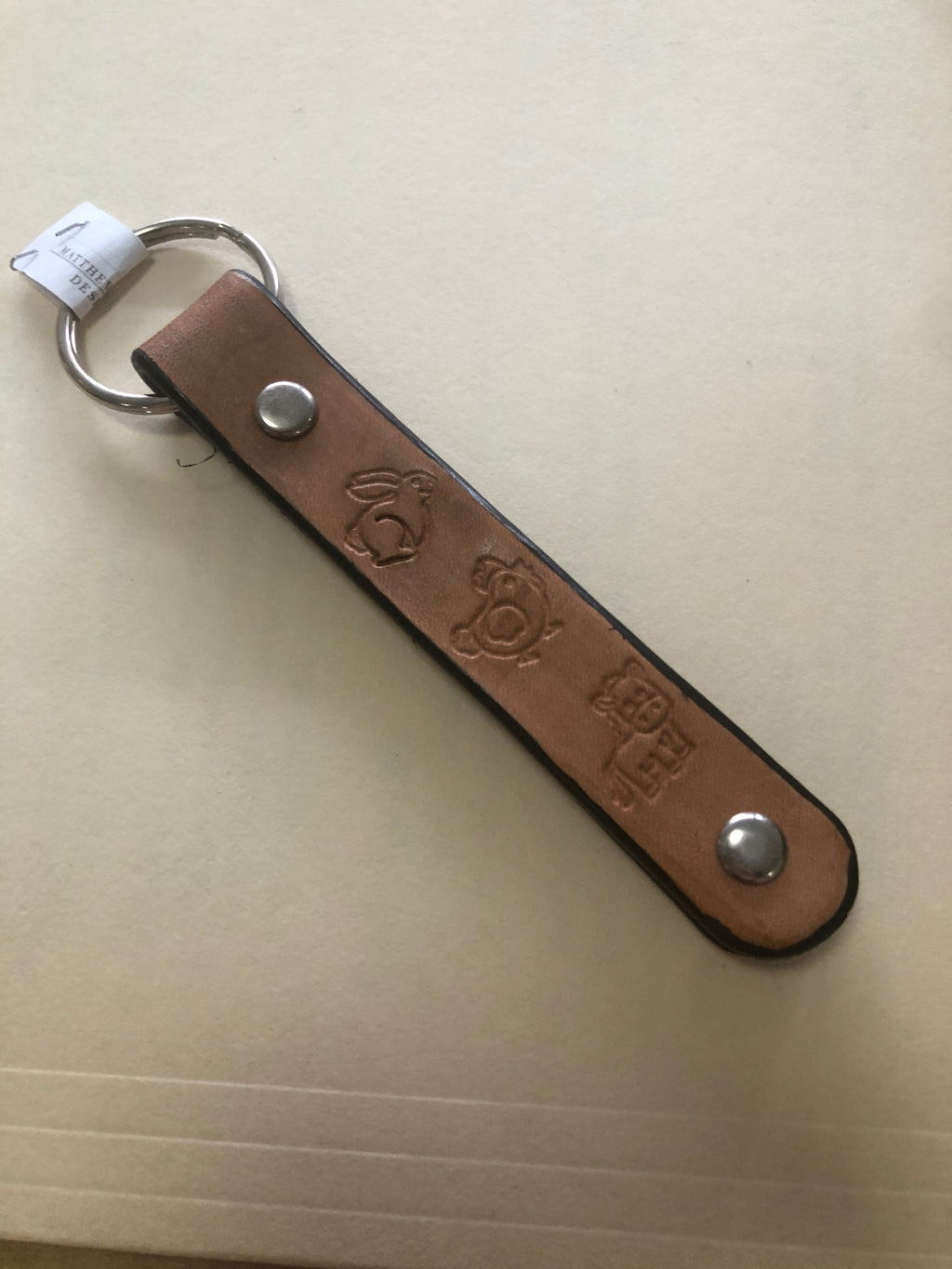 Stamped leather key chains