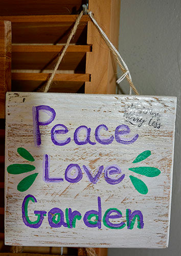 Small square folk art signs