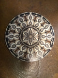 Brown and black dot art mandala