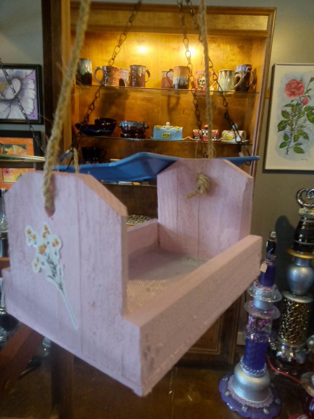 Pink hanging bird feeder