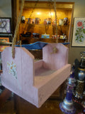 Pink hanging bird feeder
