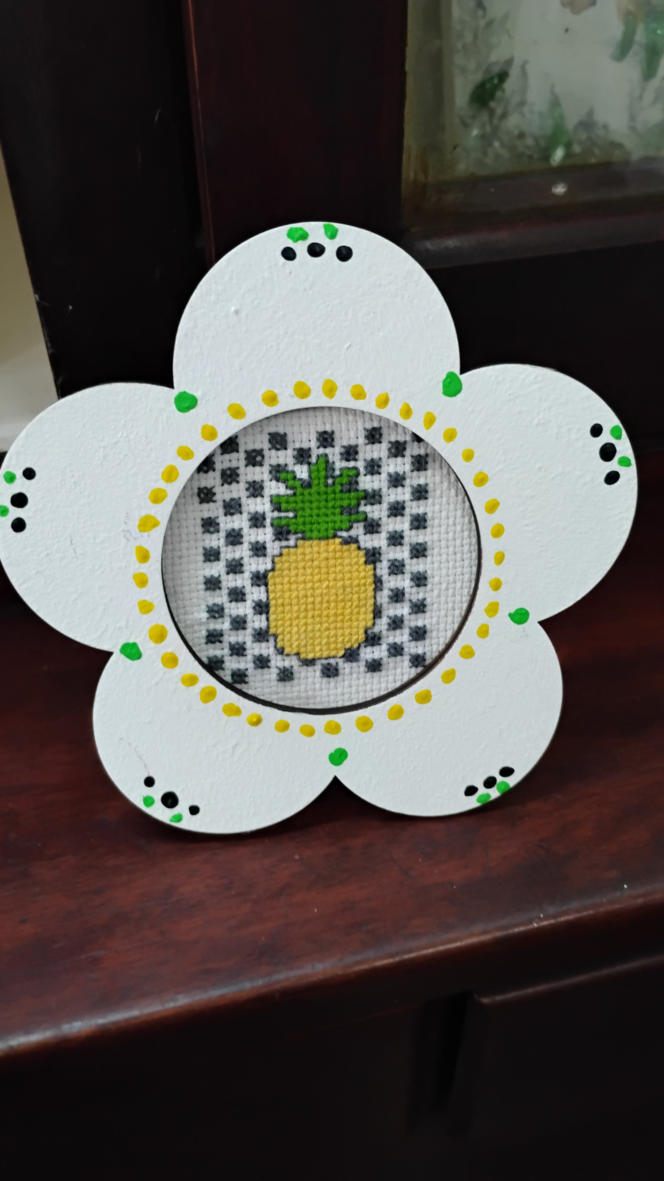 Flower framed pineapple cross stitch