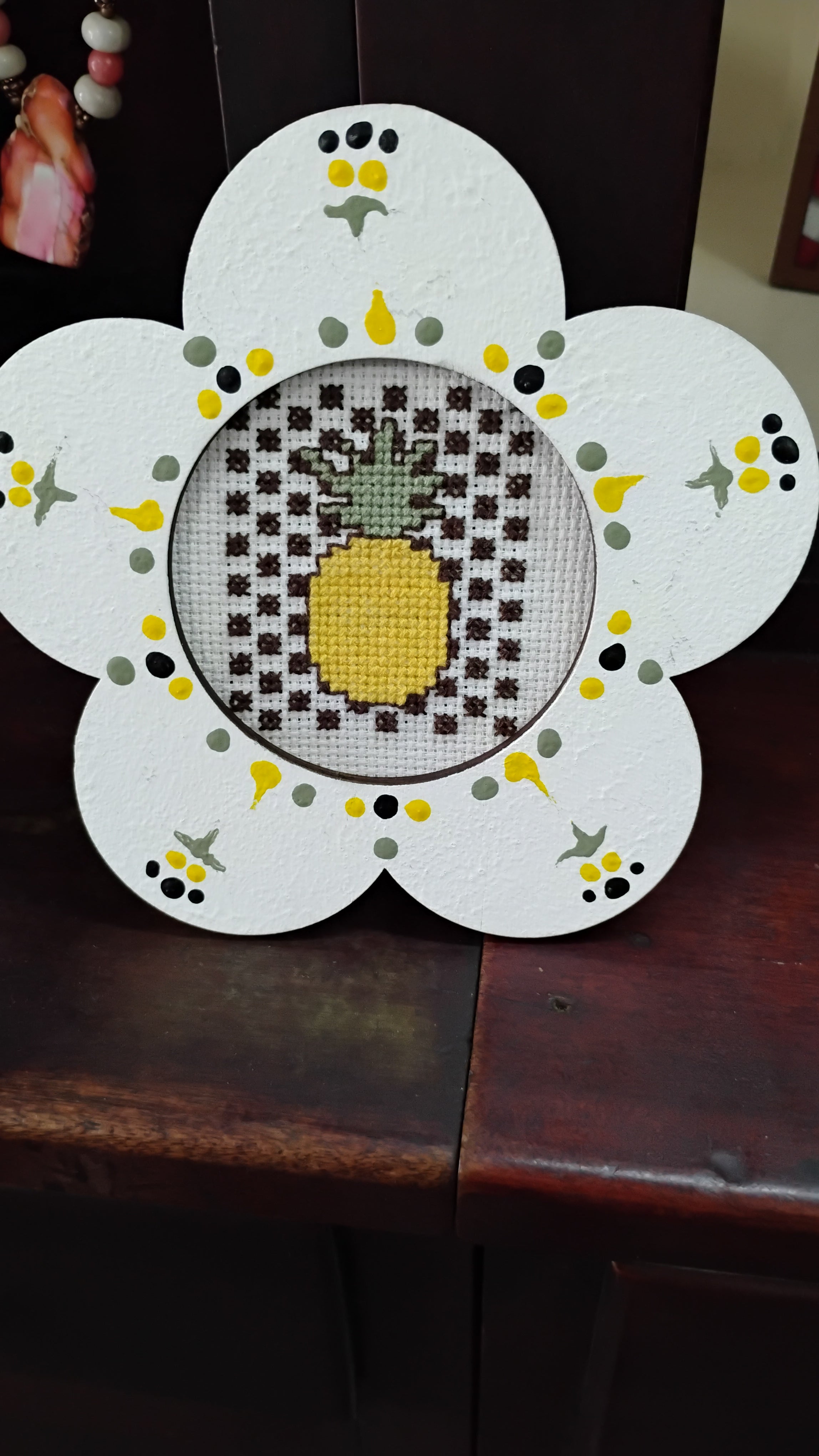 Flower framed pineapple cross stitch