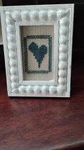 Framed cross stitch heart