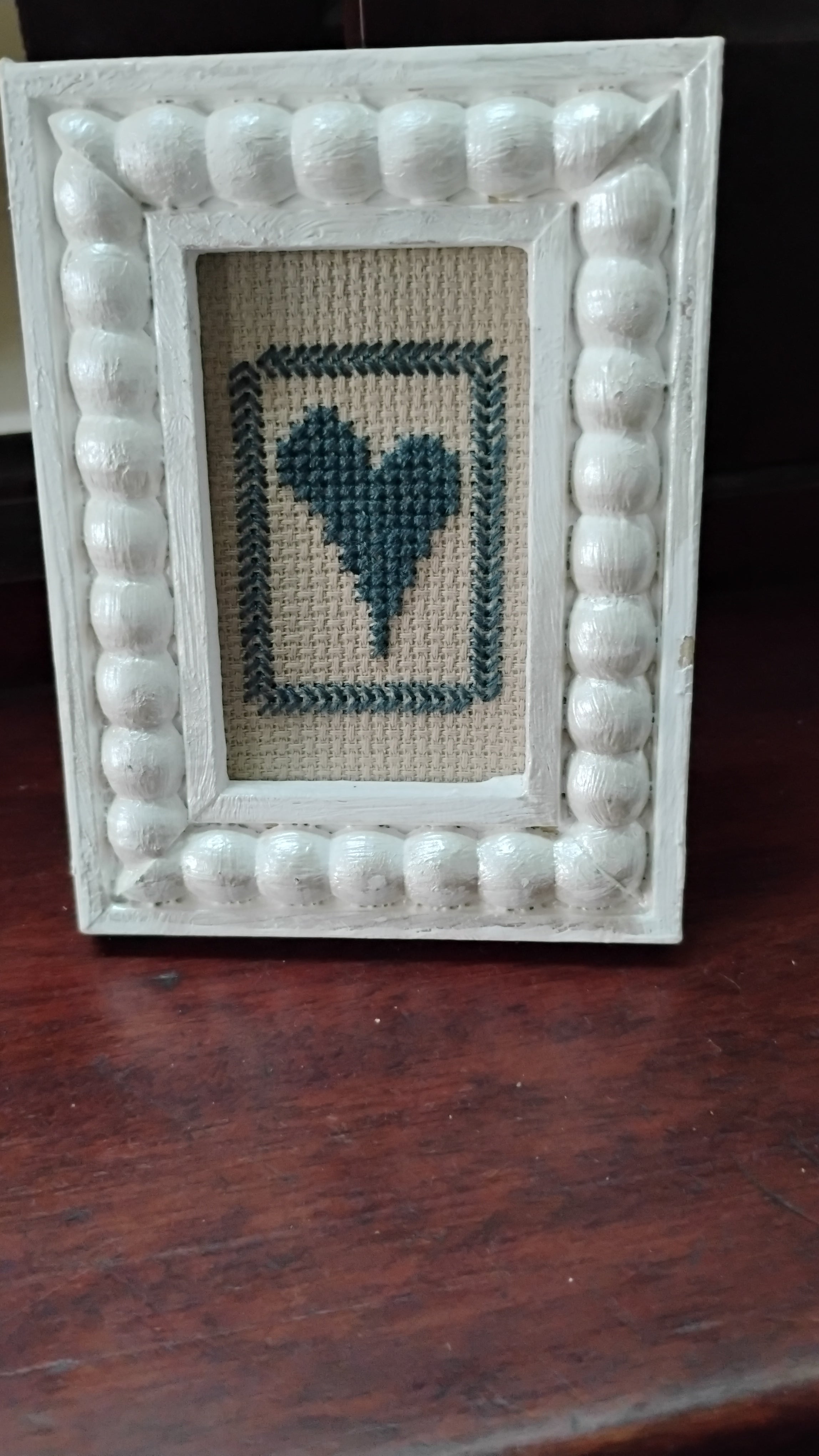 Framed cross stitch heart
