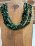 Green multi strand glass bead necklace