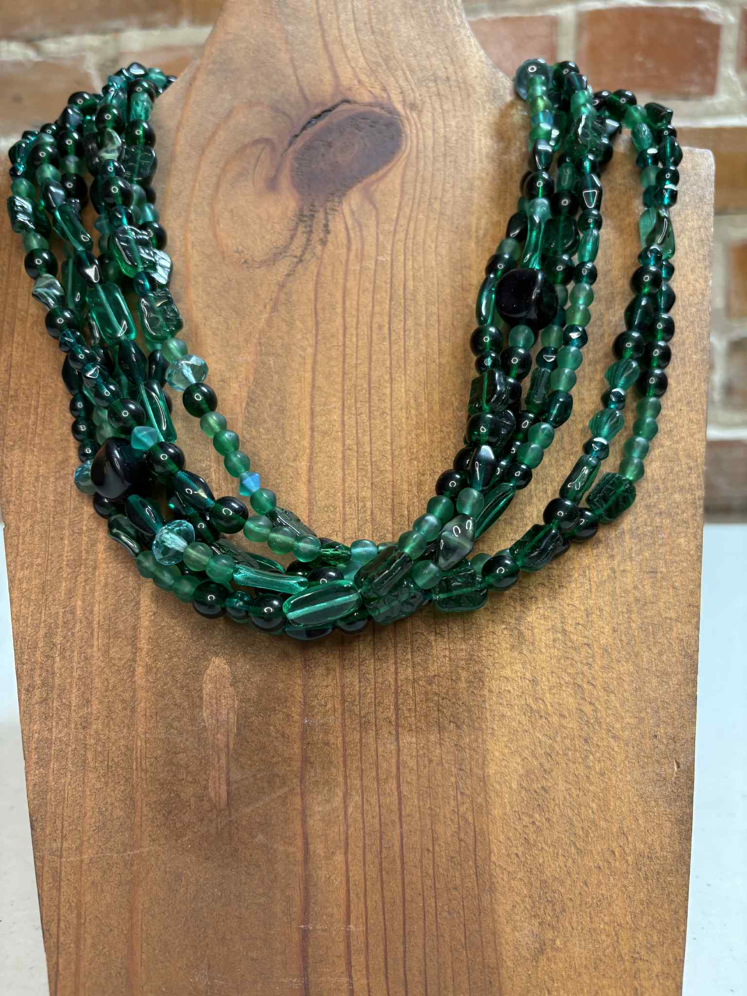 Green multi strand glass bead necklace