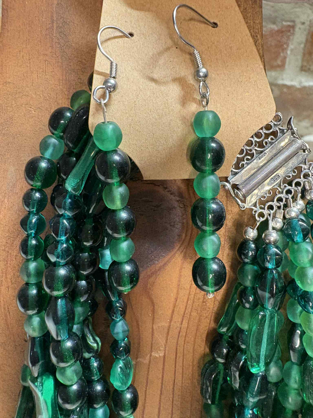 Green multi strand glass bead necklace