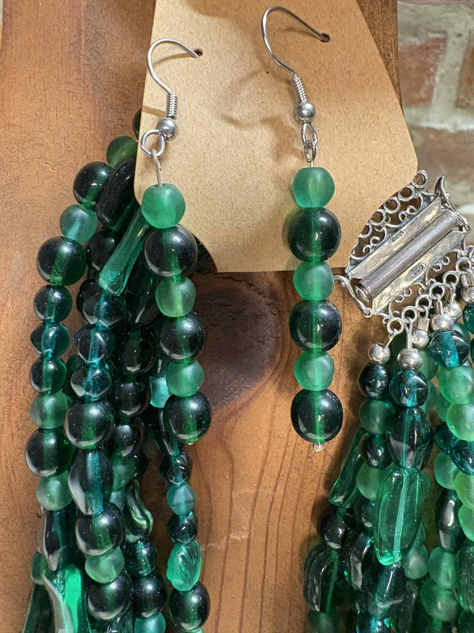 Green multi strand glass bead necklace